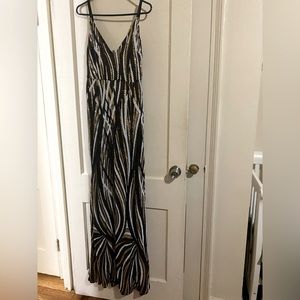 Long sequin black, white and gold dress perfect for New Years Eve or a wedding!